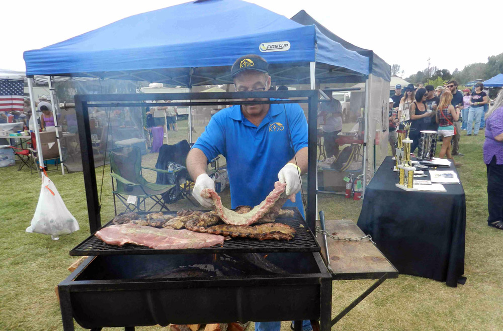 Blazin Hog loading the grill