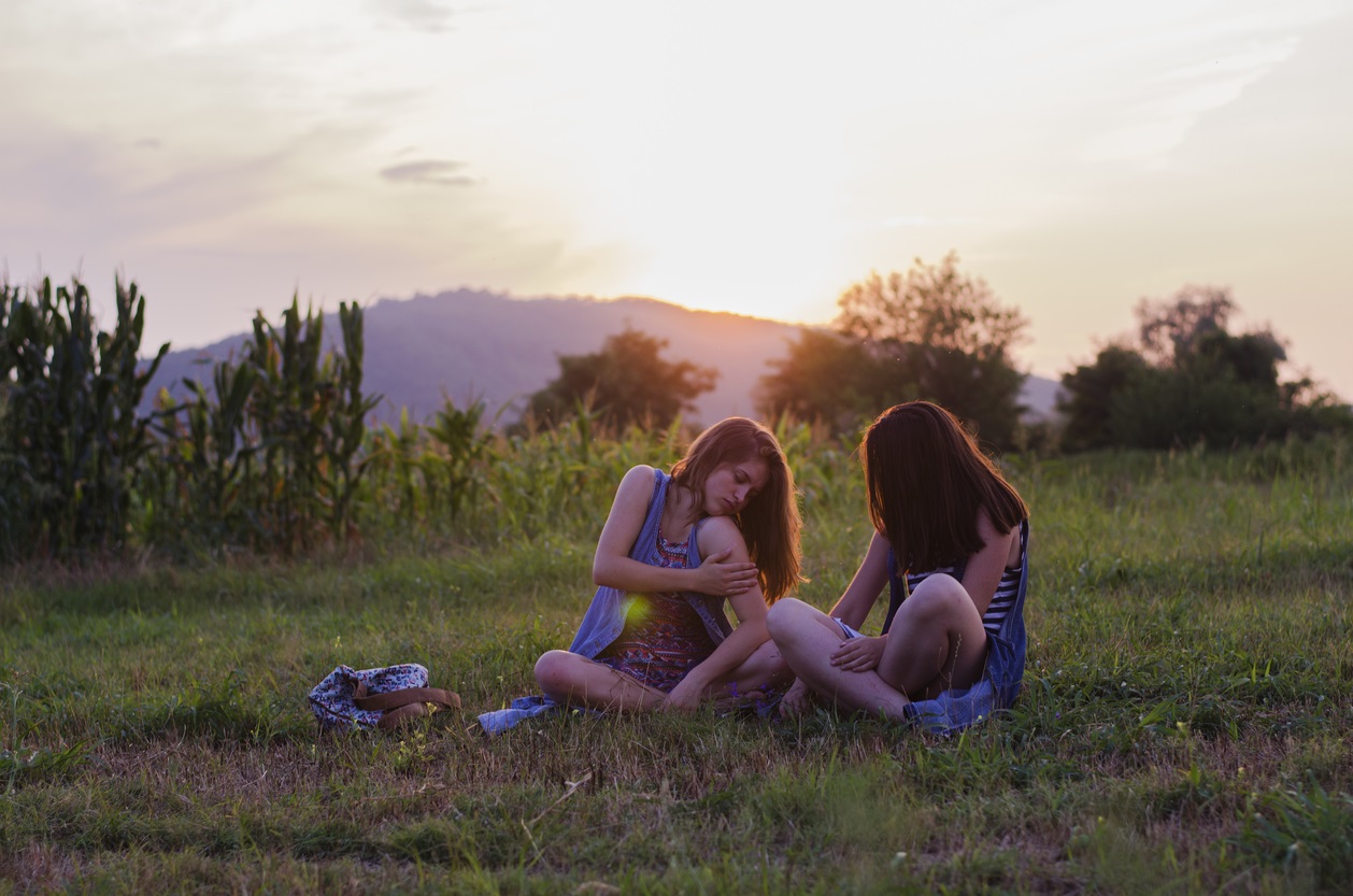Girls bothered by bugs