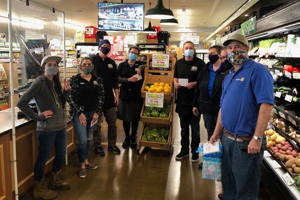 Greg Harper presenting vouchers at High Country