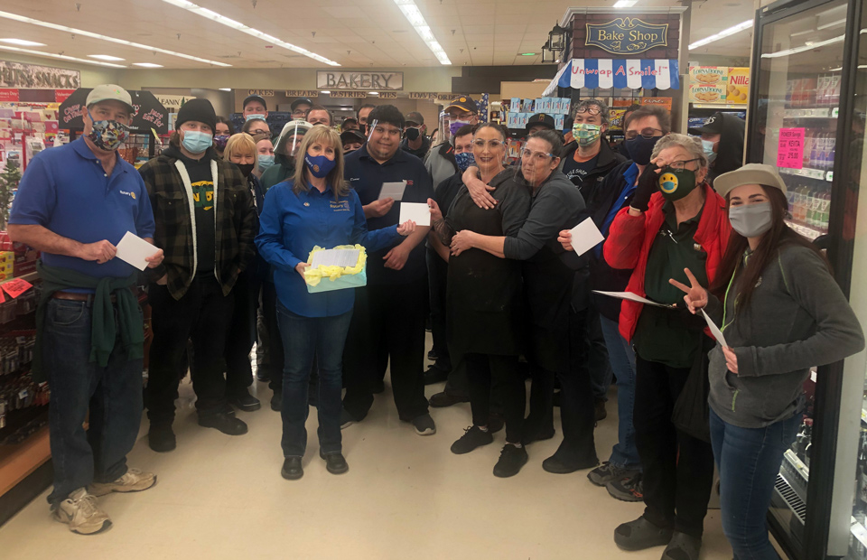 Rotary President Debbie Peters presenting vouchers at pioneer