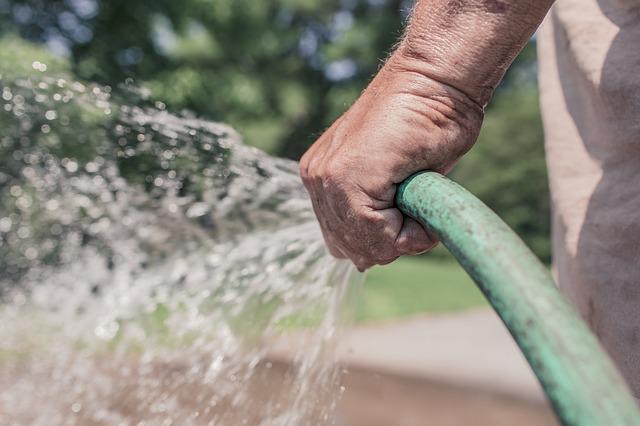 water garden hose 413684 640